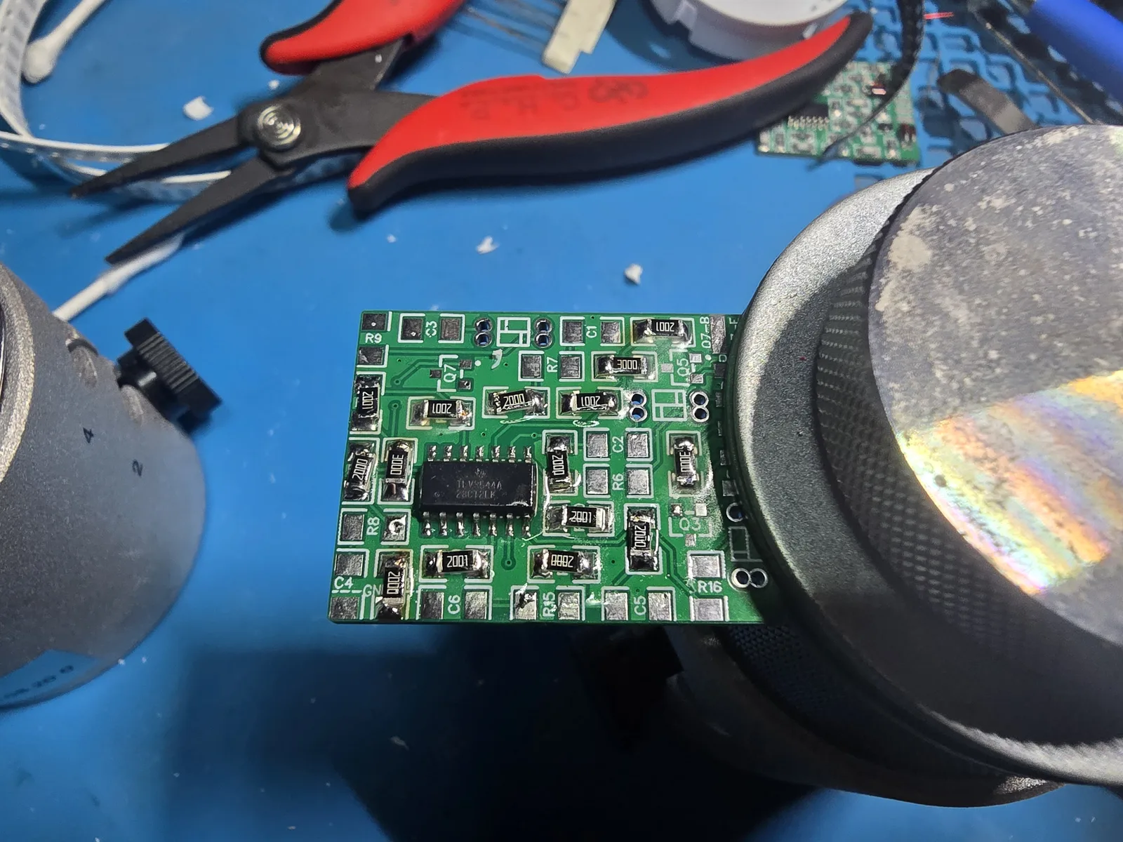 The mod board with the 200 ohm resistors added, showing 2000, 2001 and 3000 markings side by side.