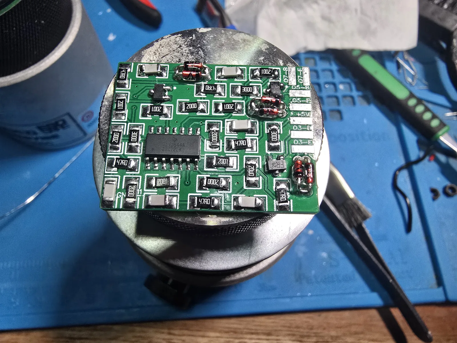 The completed mod board with op-amp, all resistors and capacitors, three transistors and six diodes fitted and cleaned.