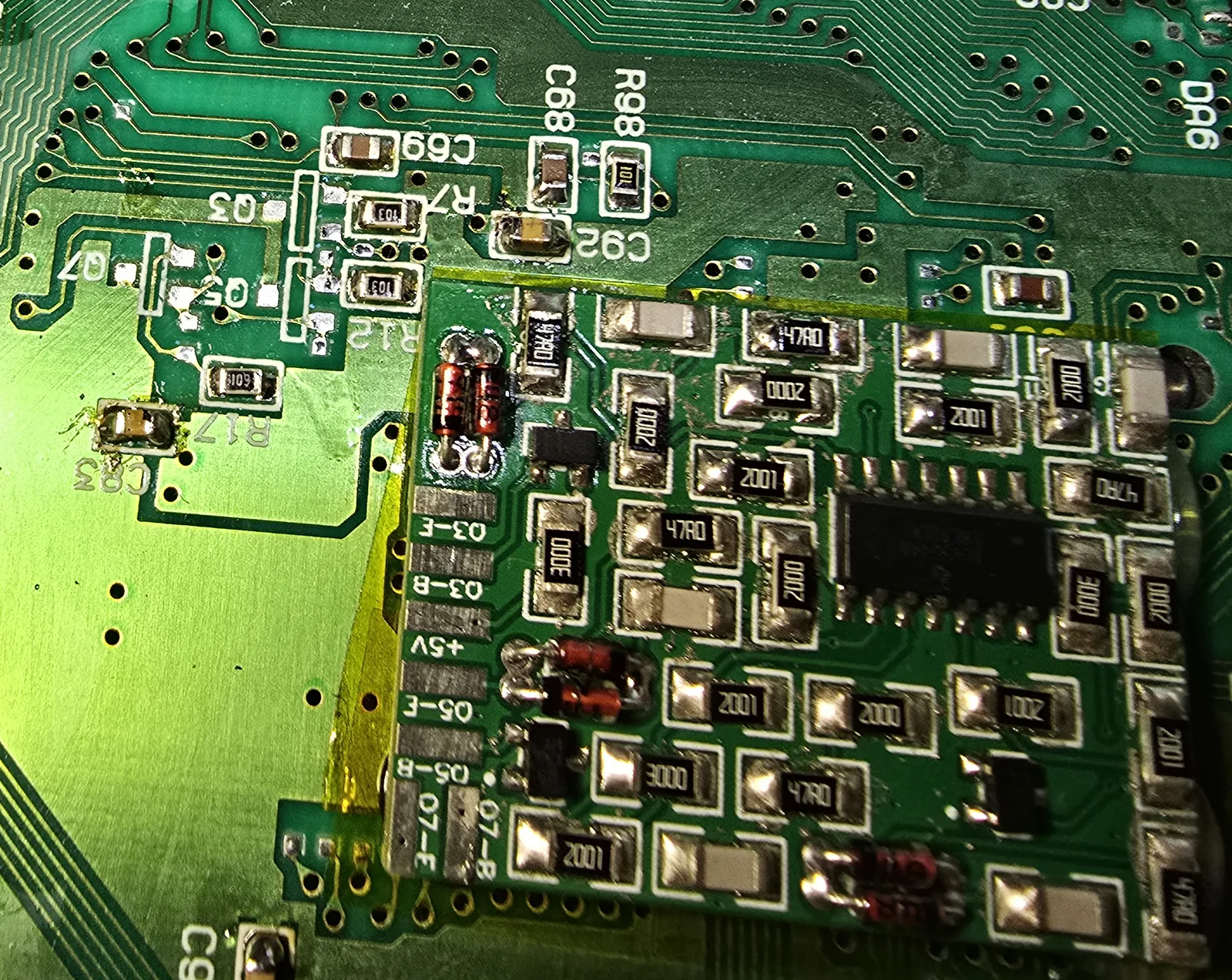 The Q3, Q5 and Q7 pads on the SNES motherboard after the transistors have been removed and the pads cleaned.