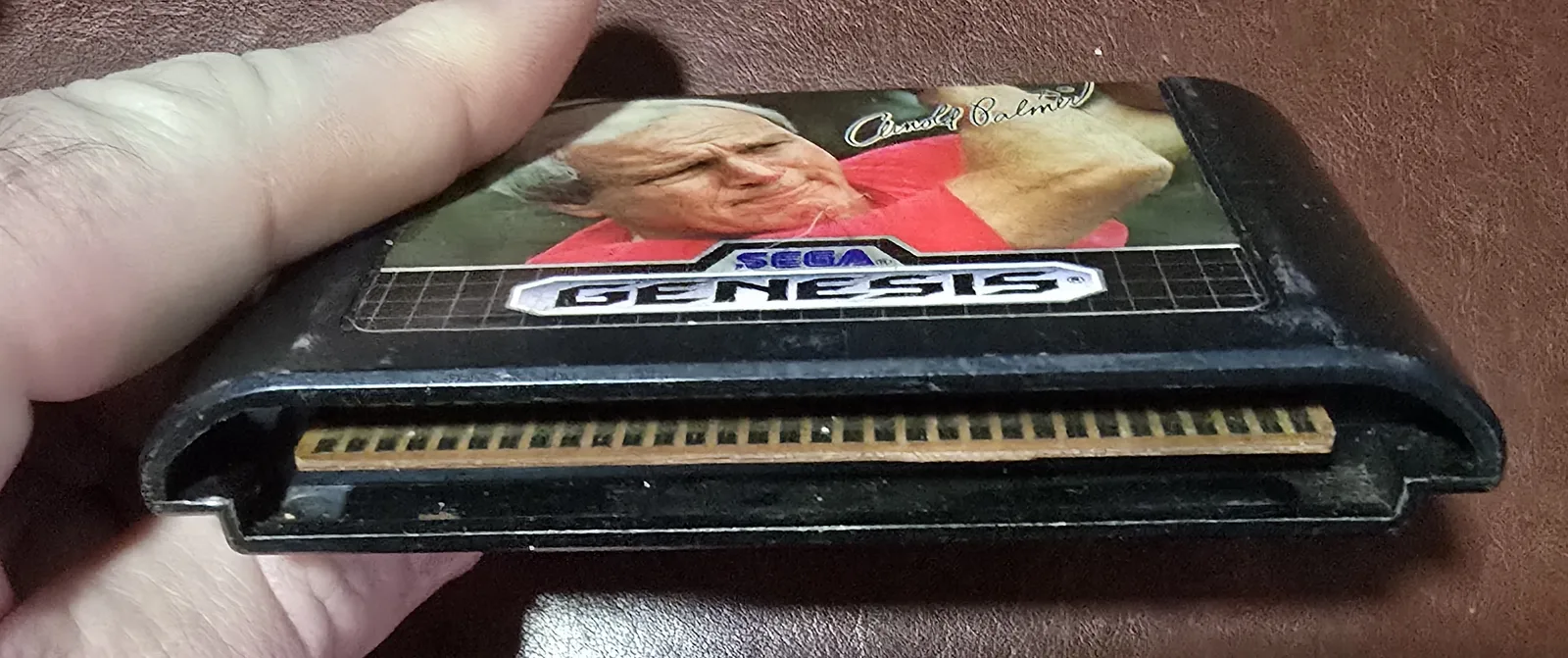Edge connector of the Genesis cartridge showing the cleaned gold contacts