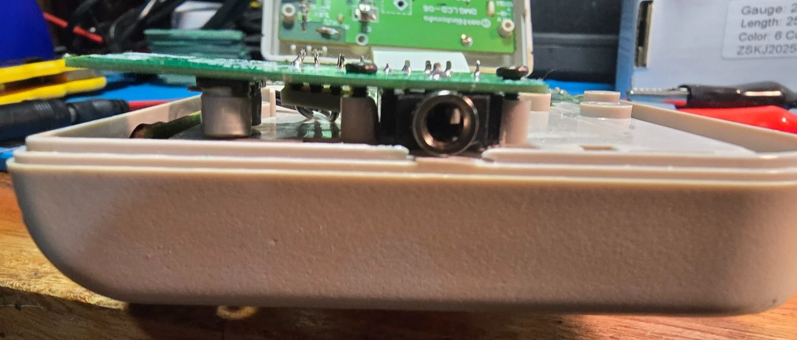 Side view of the installed board resting at a slight angle, which is normal and a sign it is not over-tightened