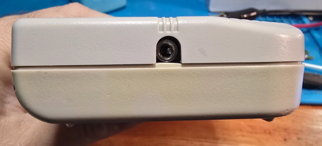 Exterior view of the new headphone jack on a fully reassembled Game Boy