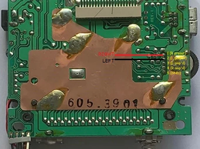 Game Boy mainboard showing where the Pro line-out wires solder onto the volume wheel pins