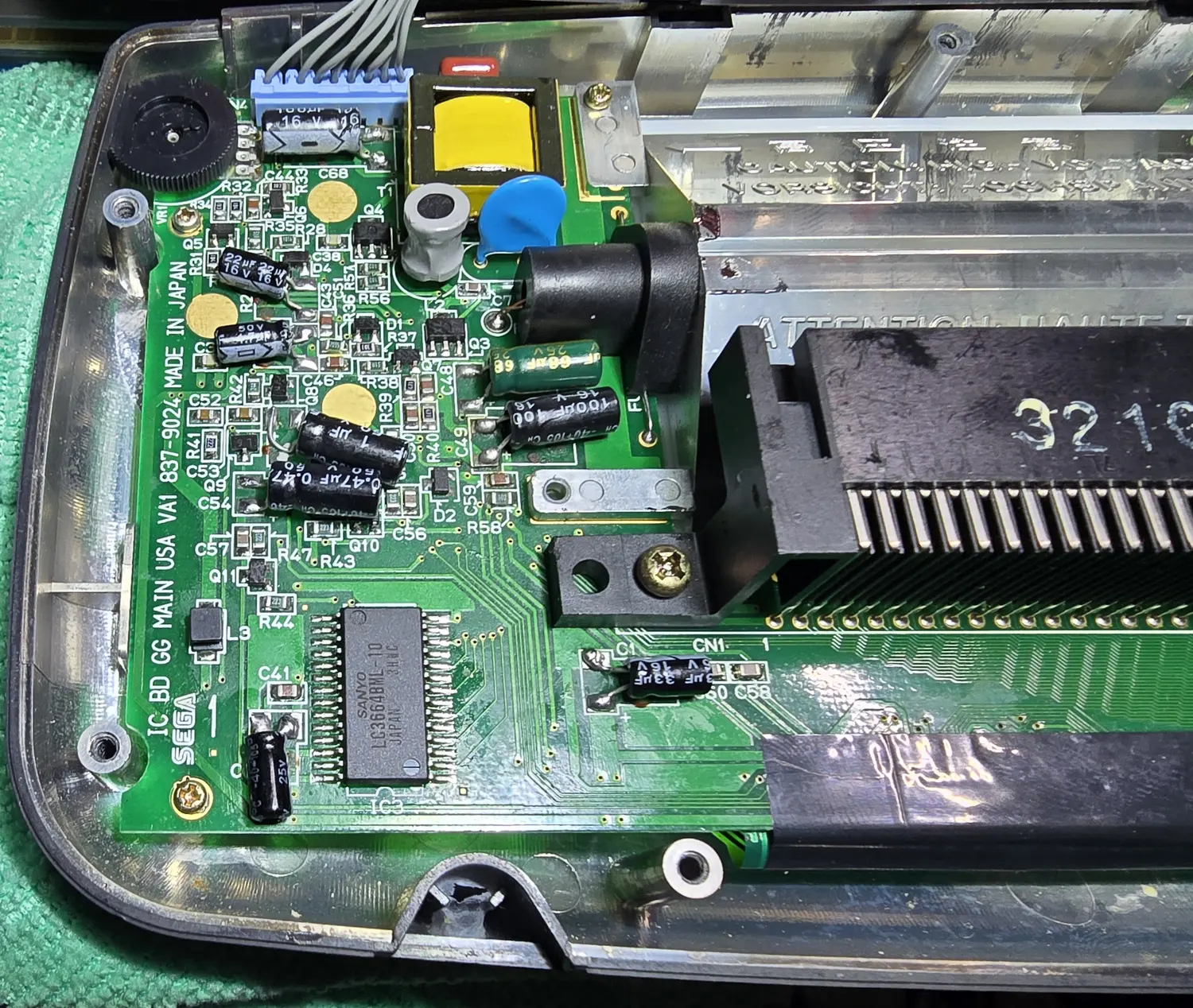 The recapped main board showing aluminium electrolytic capacitors fitted and the VA1 837-9024 silkscreen