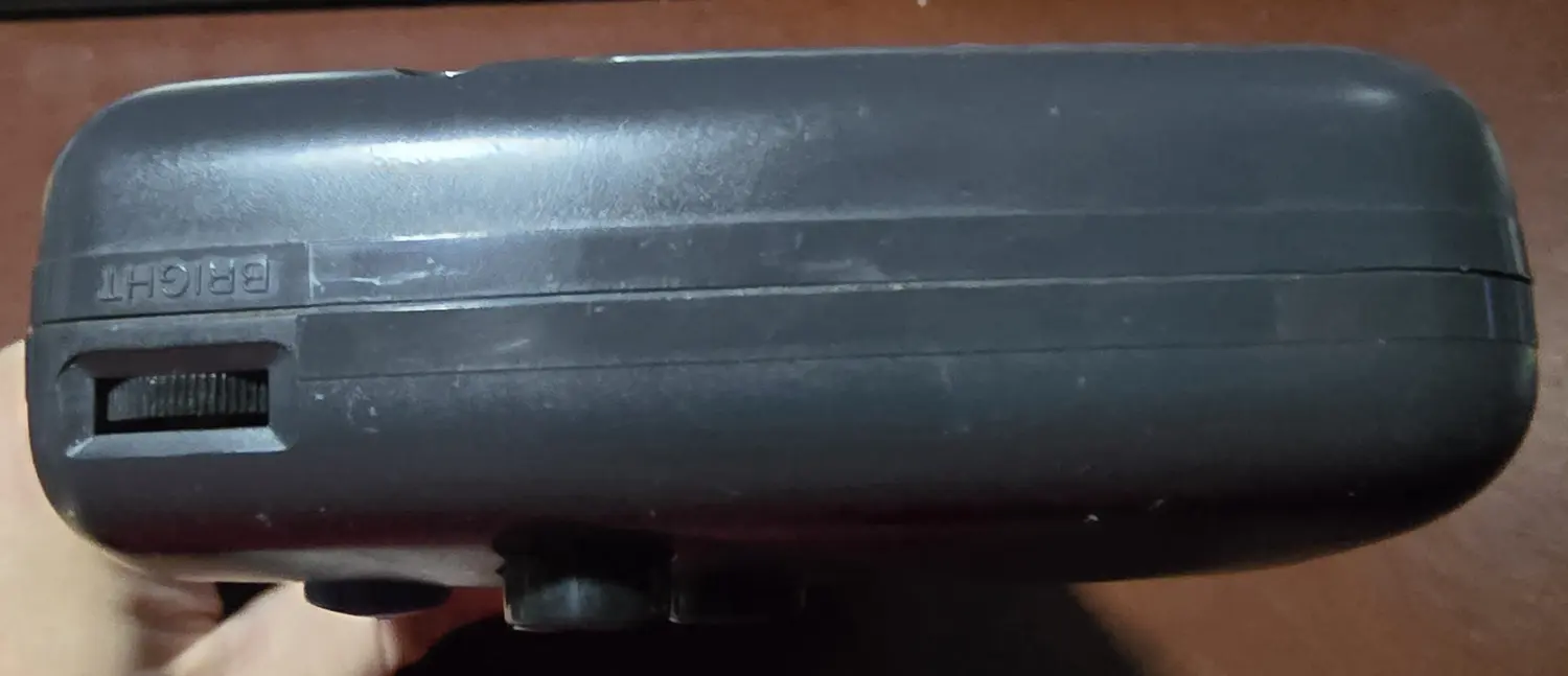 Edge of the Game Gear showing the brightness wheel