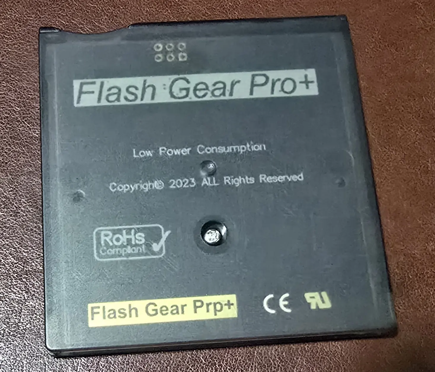 Back of the Flash Gear Pro+ cartridge showing its moulded Flash Gear Pro+ and RoHs Compliant markings