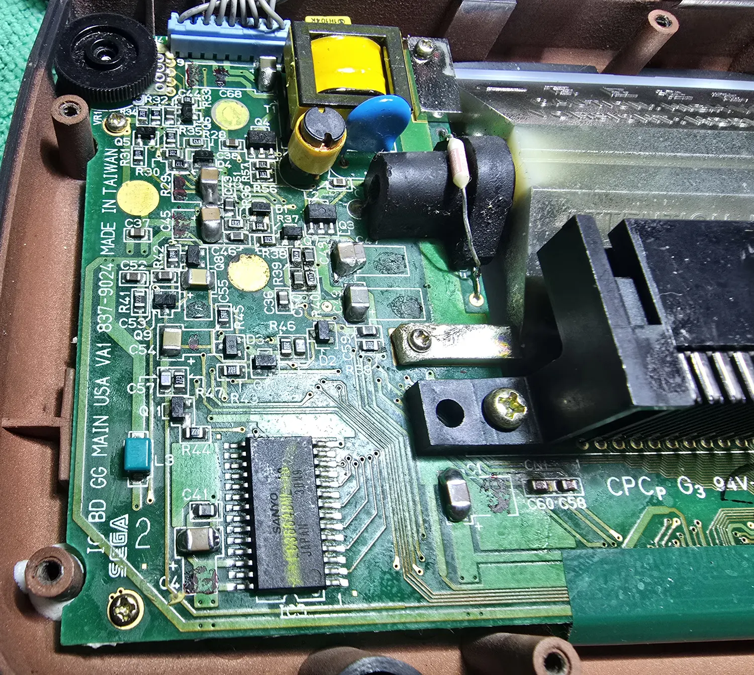 The recapped main board, showing ceramic capacitors fitted throughout and the VA1 837-9024 silkscreen