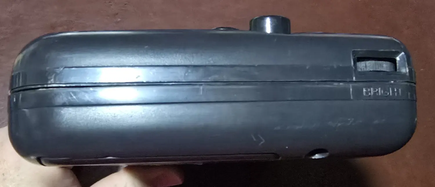 Edge of the Game Gear showing the brightness wheel