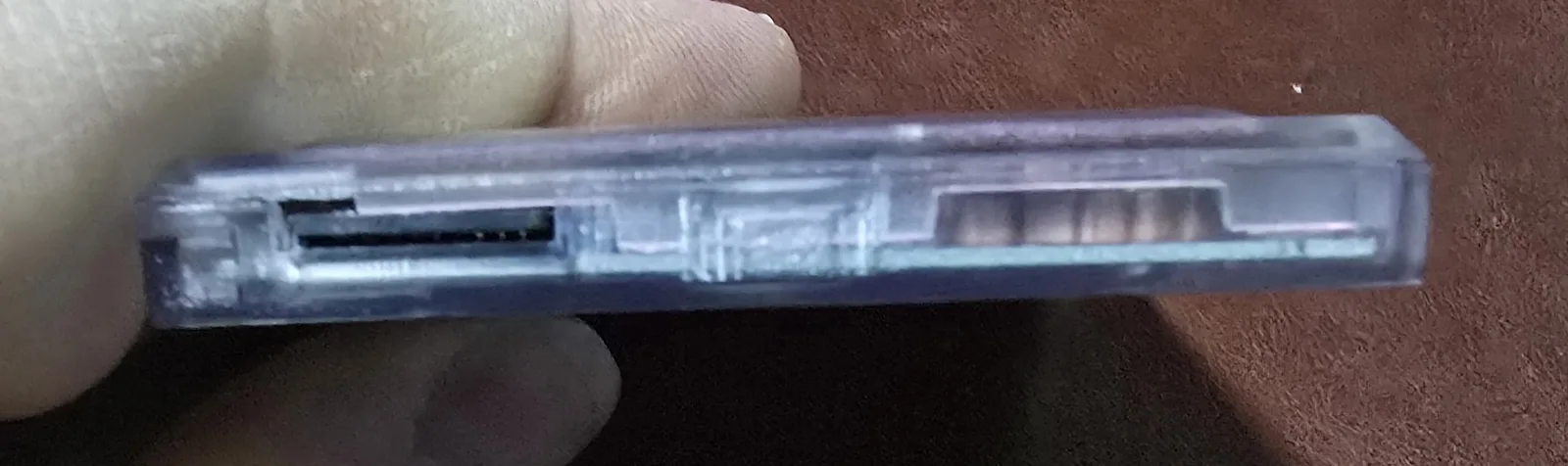 Top edge of the GB Pro+ flash cartridge showing the microSD card slot
