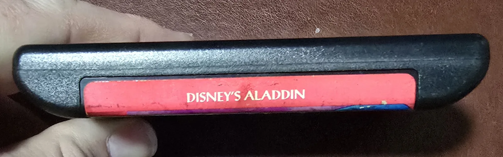 Top spine label of the cartridge reading Disney's Aladdin