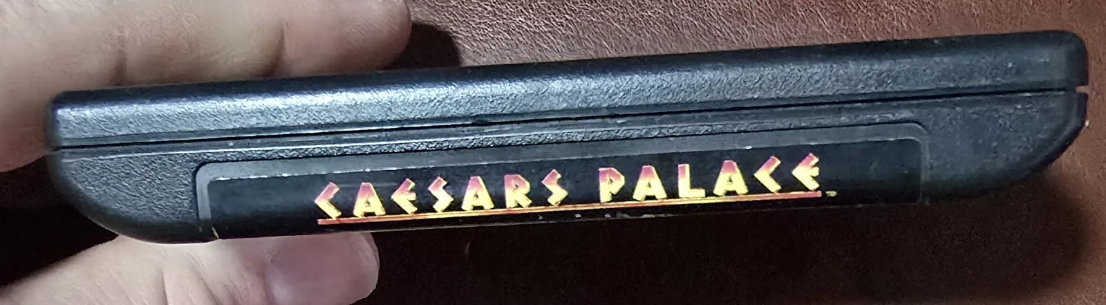 Top spine label reading Caesars Palace on the Genesis cartridge