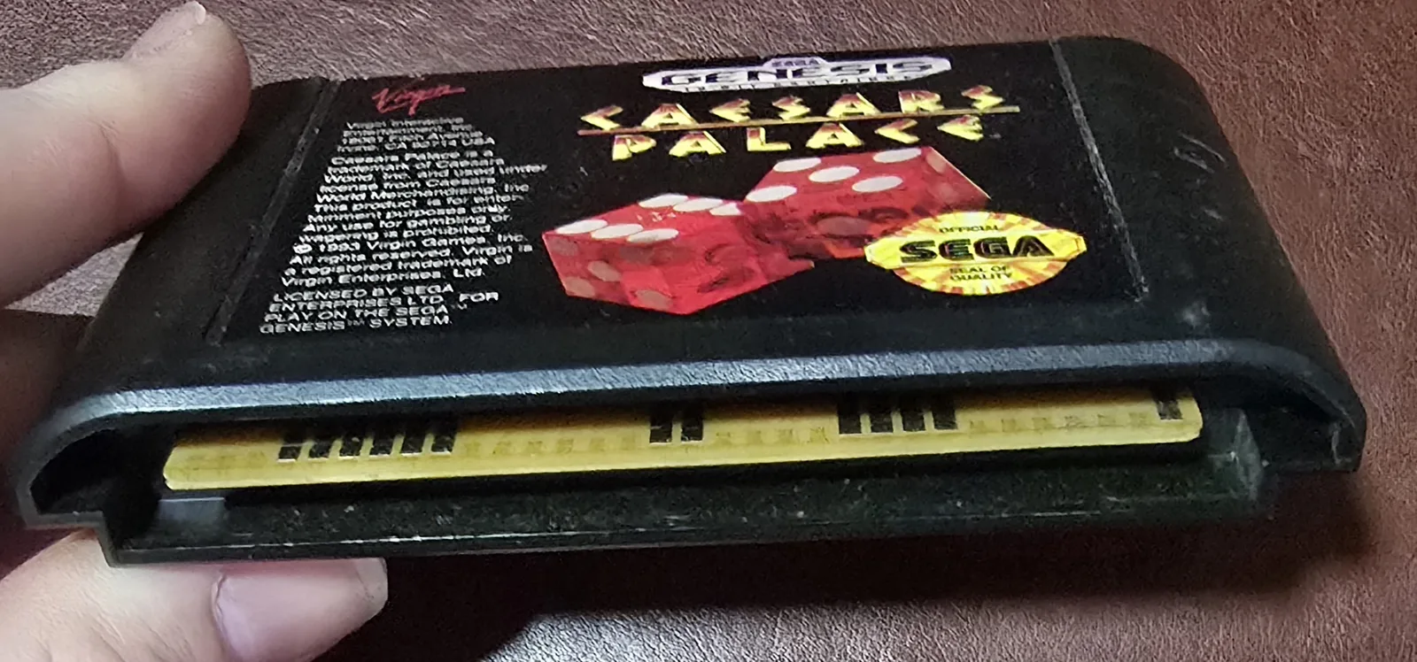 Edge connector of the Genesis cartridge showing the cleaned gold contacts