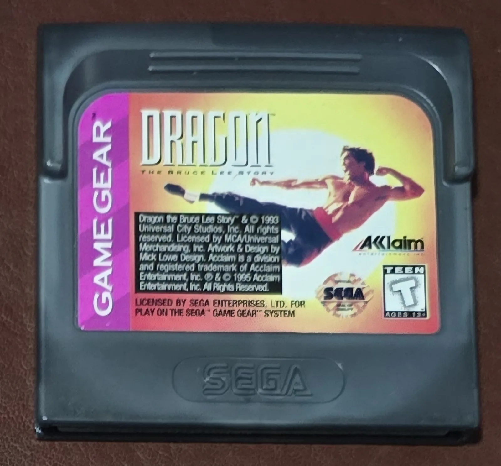 Front of an authentic Sega Game Gear Dragon: The Bruce Lee Story cartridge