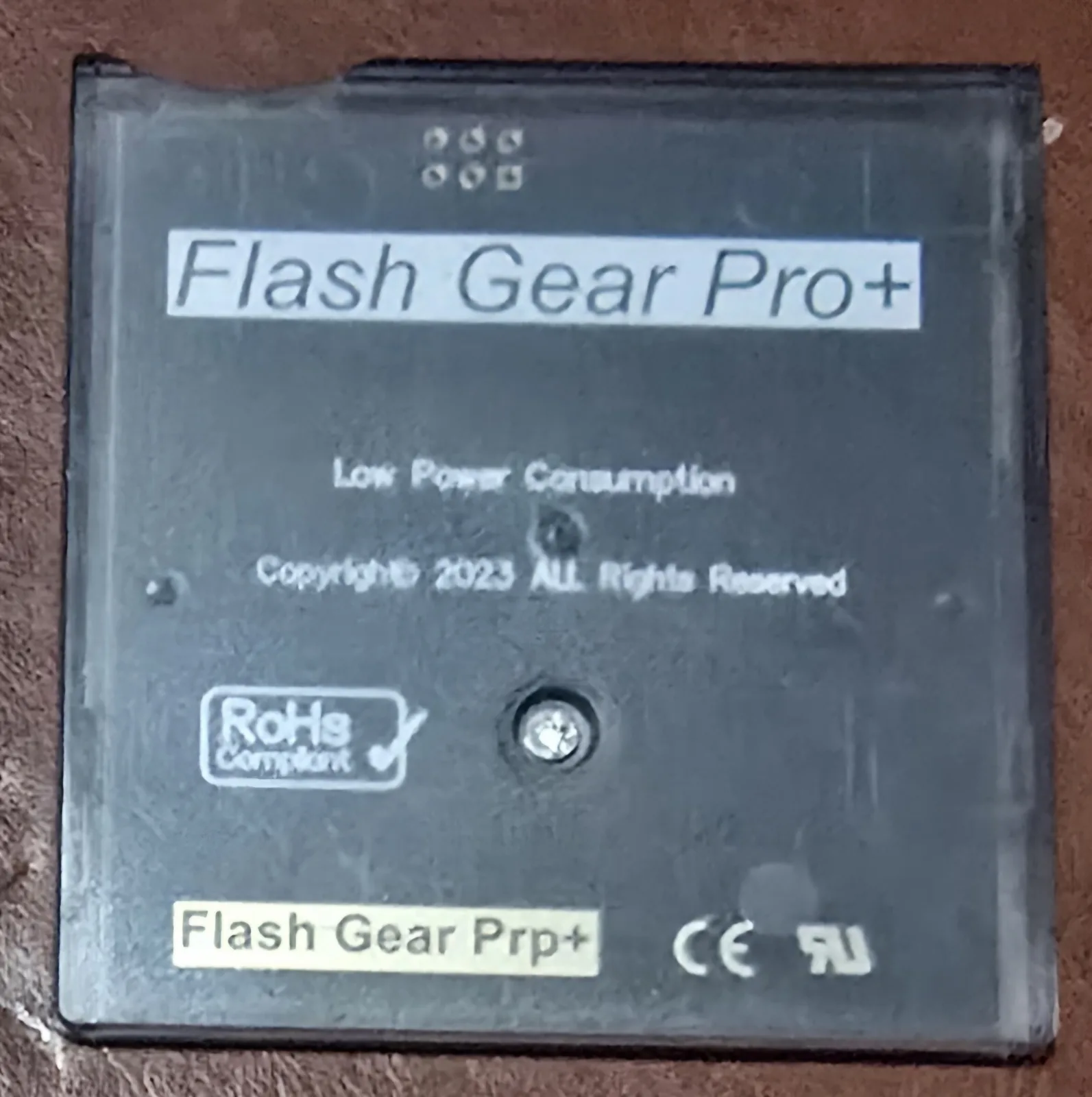 Back of the Flash Gear Pro+ flash cartridge showing the microSD-based board through the translucent shell