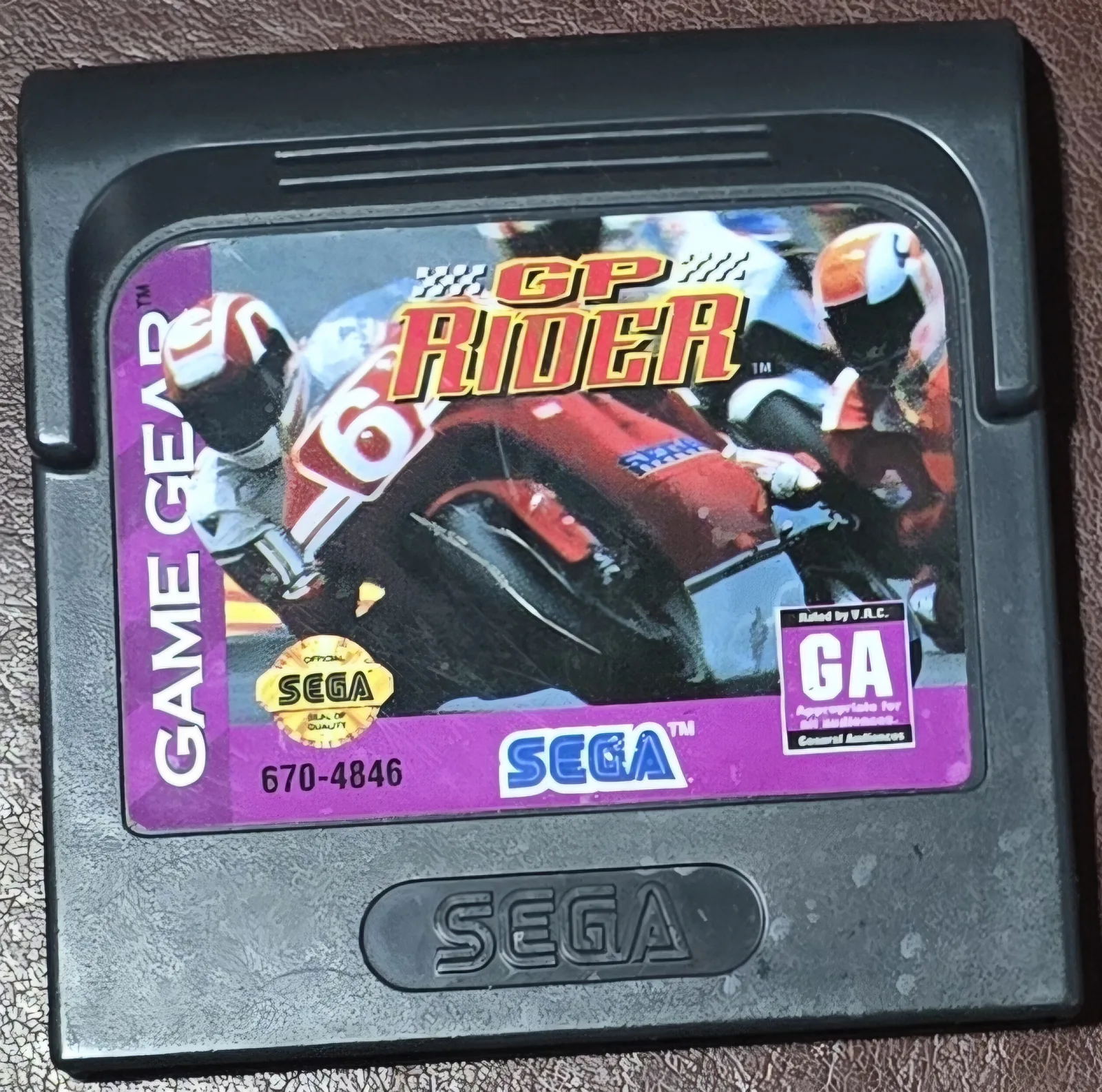 Front of an authentic Sega Game Gear GP Rider cartridge, motorcycle-racing label