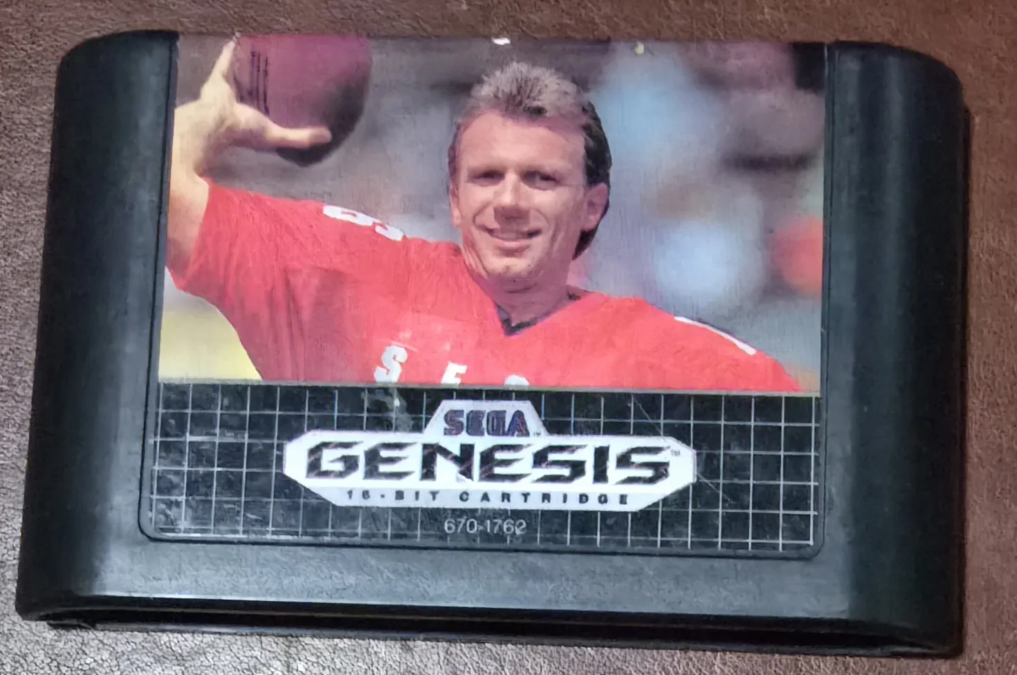 Front label of an authentic Sega Genesis Joe Montana II Sports Talk Football cartridge