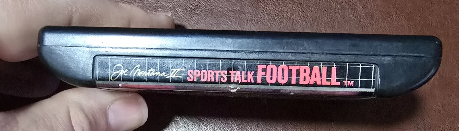 Top spine label reading Joe Montana II Sports Talk Football on the Genesis cartridge