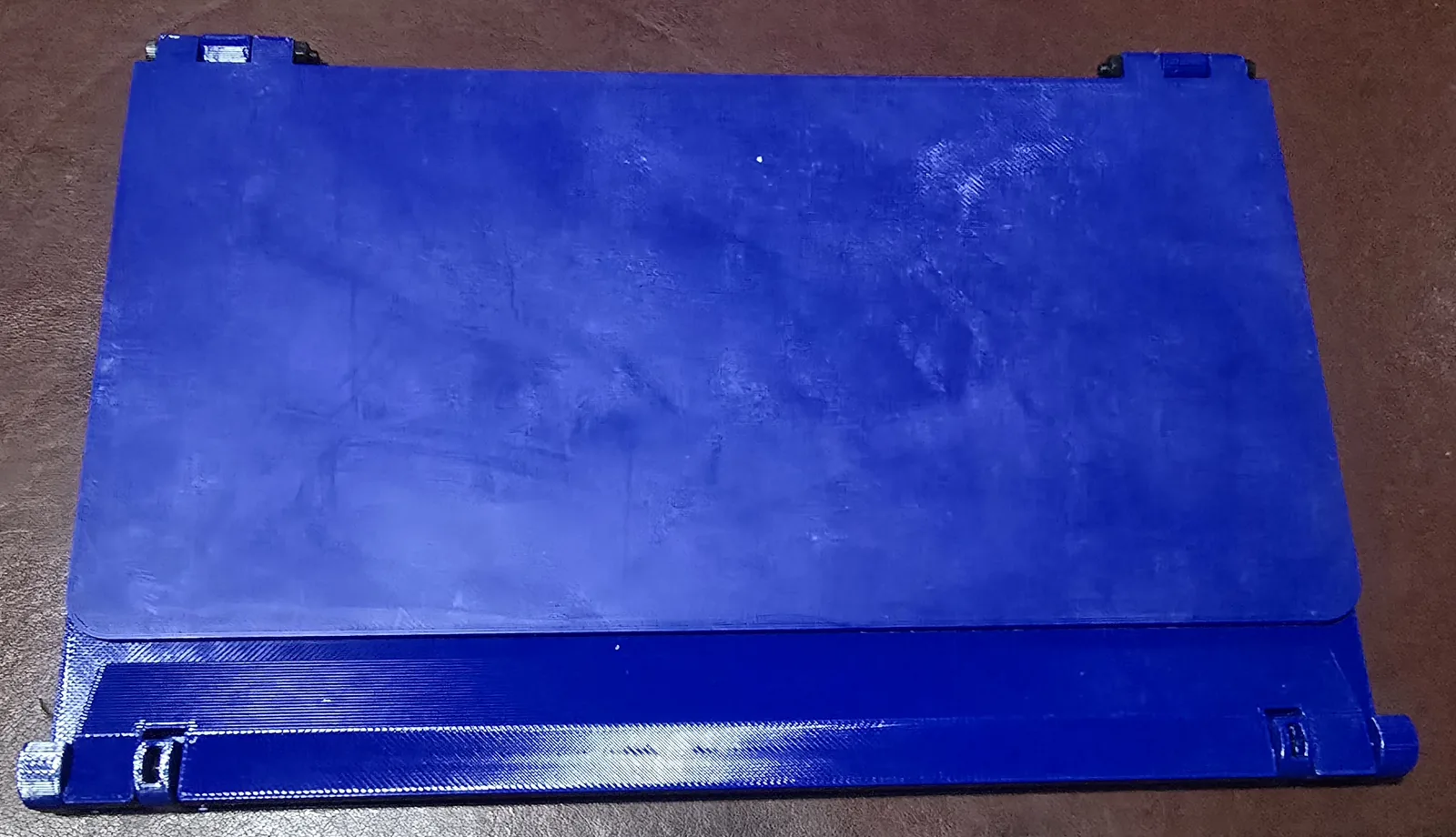 The Mahjong card holder folded flat with the ledge tucked in