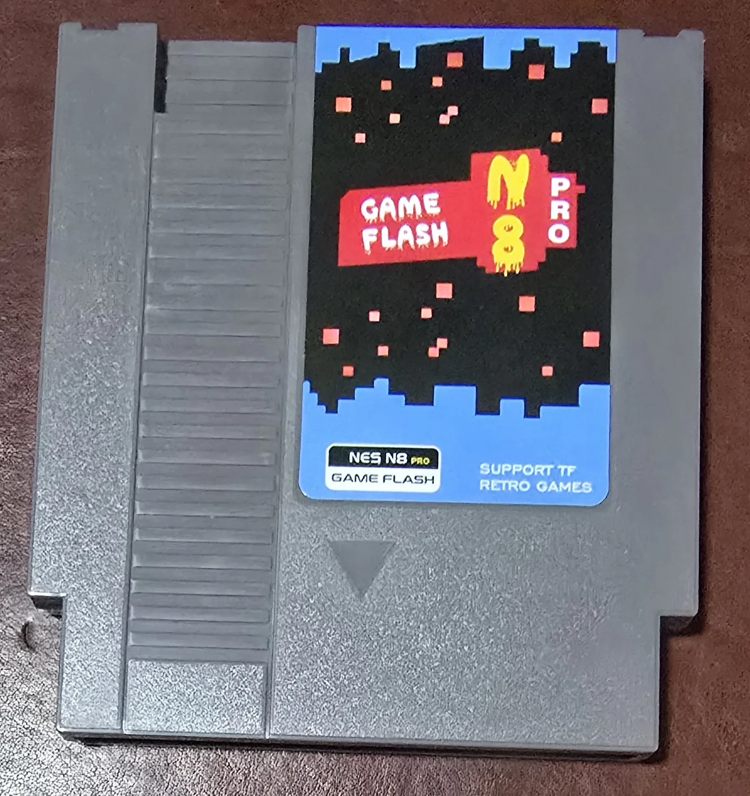 The same NES flash cart in a different shell with a blue Game Flash N8 Pro label, showing the label varies unit to unit