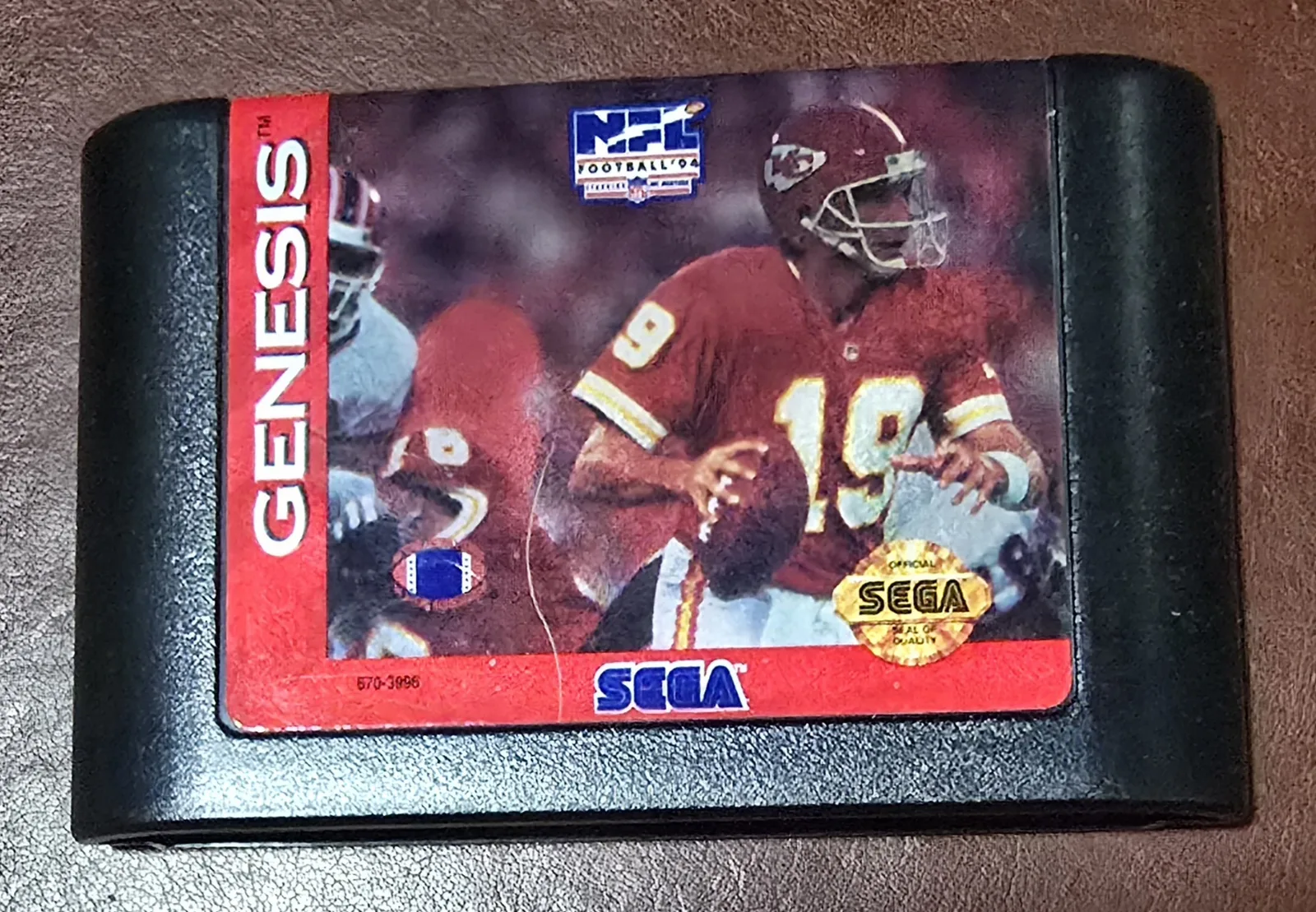 Front label of an authentic Sega Genesis NFL Football '94 Starring Joe Montana cartridge