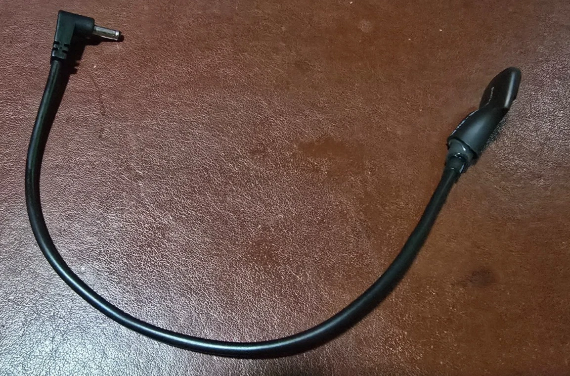 An assembled prototype USB-C power dongle, representative of what you'll receive — your unit's exact appearance will vary