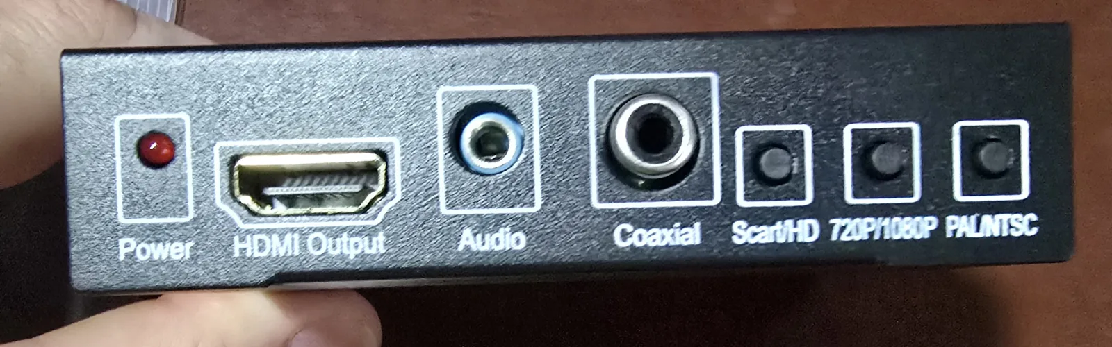Output side of the converter: HDMI output, 3.5mm and coaxial audio out, and switches for input, resolution and PAL/NTSC