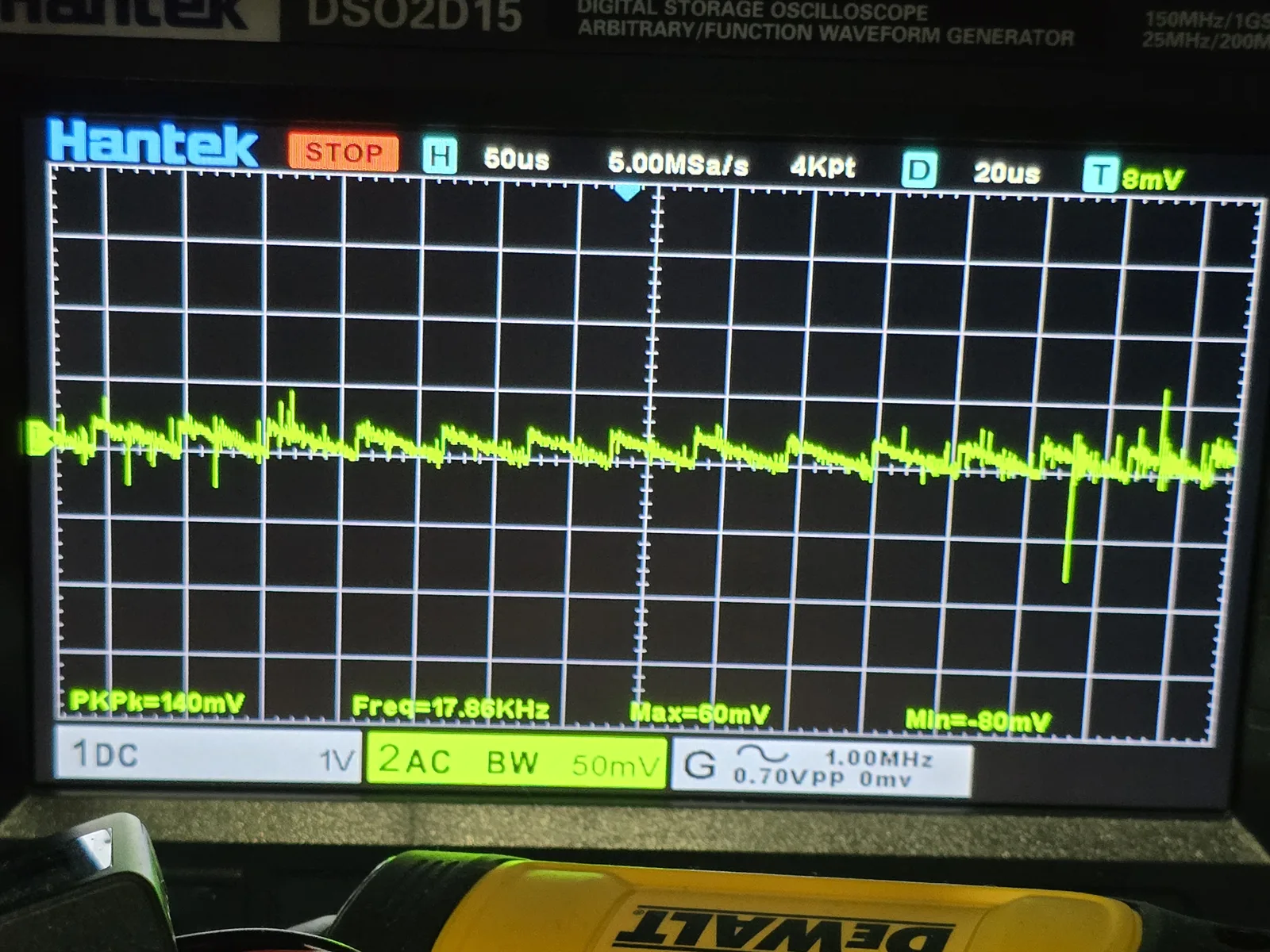 Oscilloscope showing switching ripple on the output at low load in the boost converter's default PWM mode