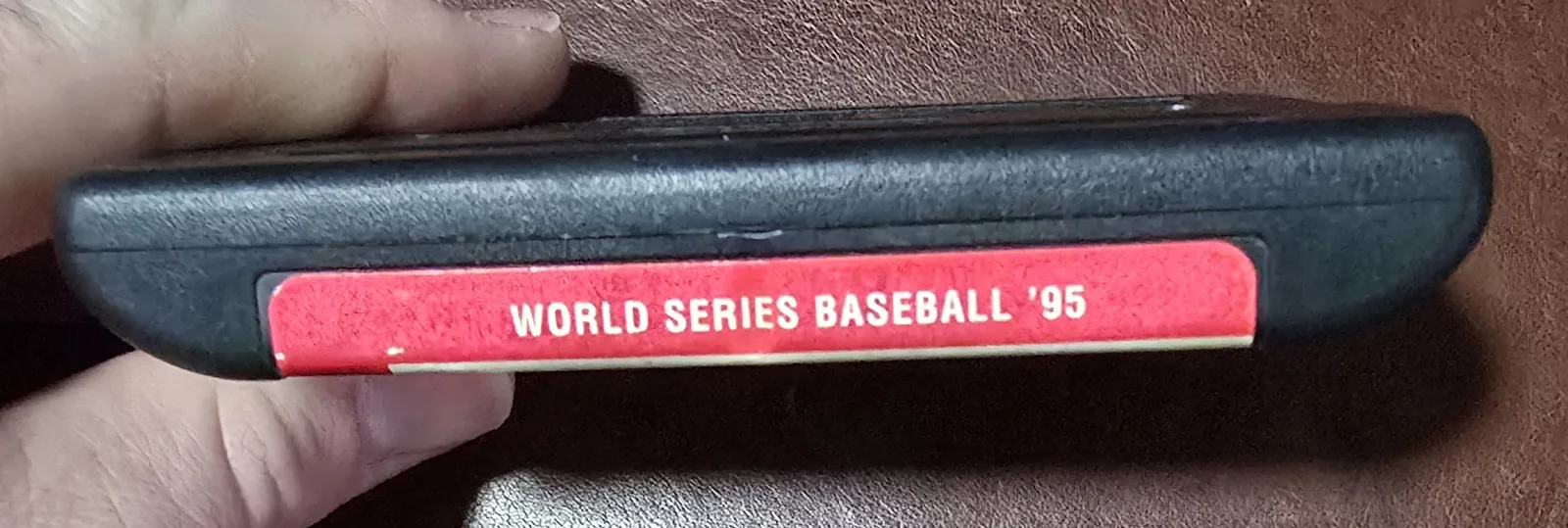Top spine label reading World Series Baseball '95 on the Genesis cartridge
